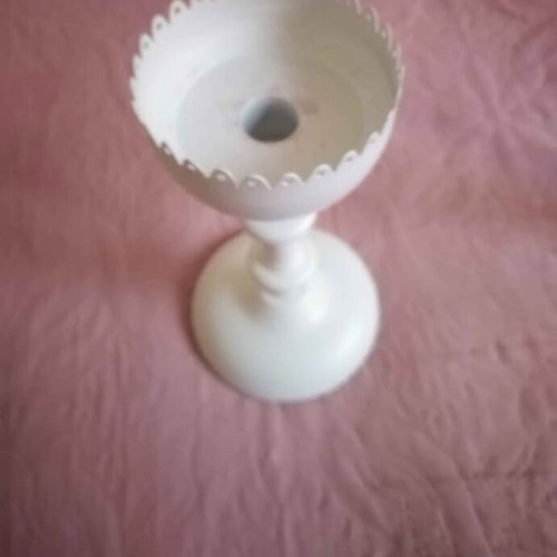 Set of two white metal candlesticks with candle like new