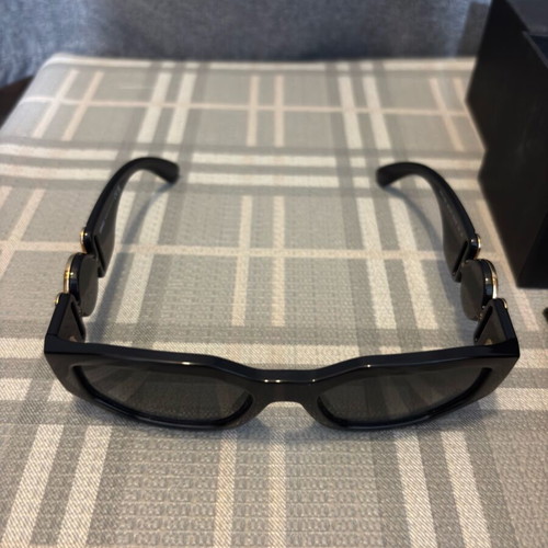 Versace sunglasses for women like new, black and gold