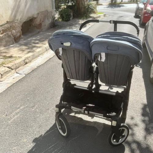 Bugaboo Donkey Twin stroller used with extension for third child