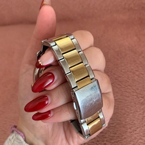 Vogue women's watch like new, two-tone gold and silver with rhinestones