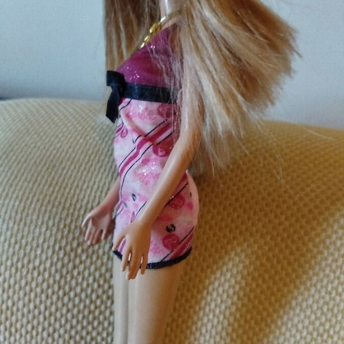 Barbie doll like new with purple dress and gold necklace from 2009 collection