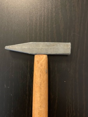 Small hammer used, as shown