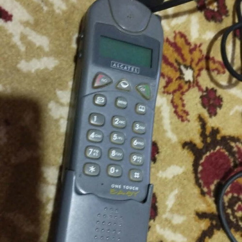 Alcatel One Touch Easy vintage mobile phone used with charger