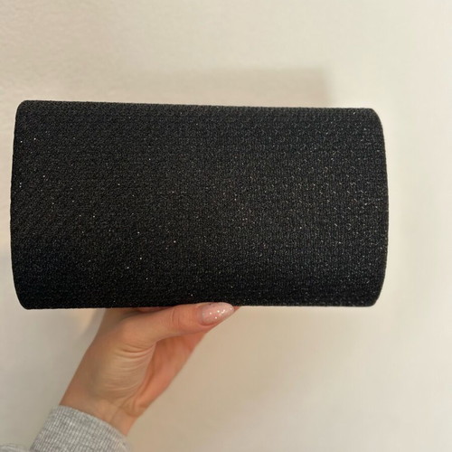 Black clutch handbag like new with embossed texture