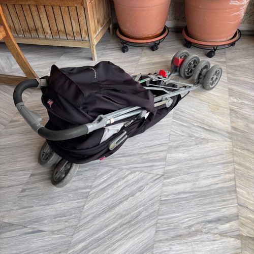 Maclaren Techno XLR stroller used with accessories and carrycot