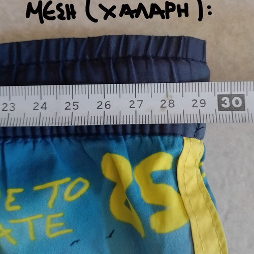 Losan boys' swim shorts used, size 104 cm, blue and yellow, skate theme