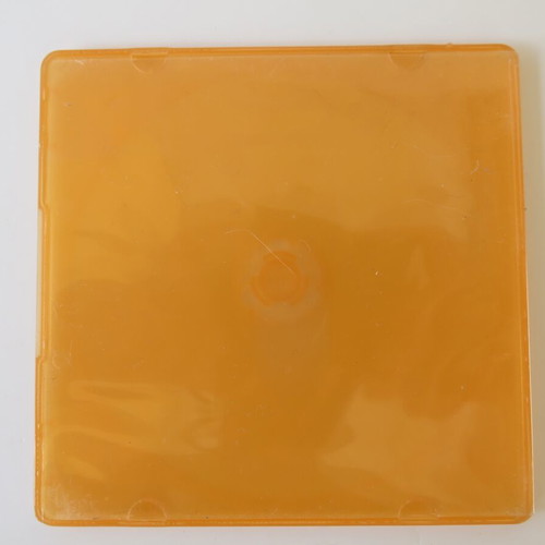 CD/DVD slim case orange like new, one-piece clamshell