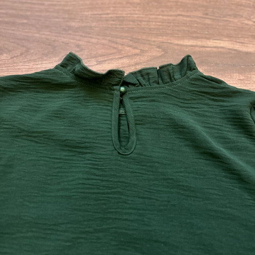 Blouse dark green size S like new with ruffle neck and cuffs