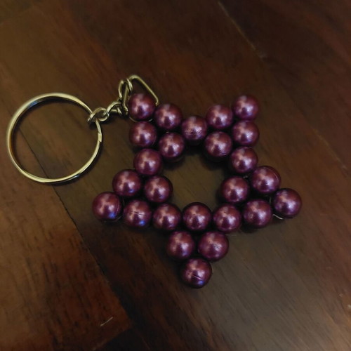 Handmade star keychain with purple pearl beads and metal ring