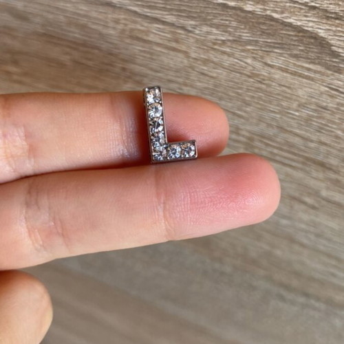Decorative bead shaped like L, like new, silver