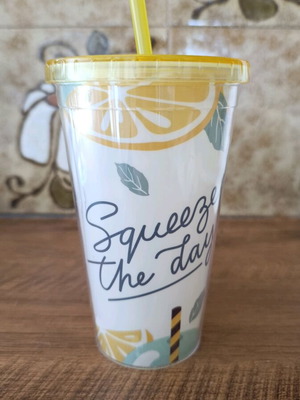 Plastic water bottle new with straw, yellow design