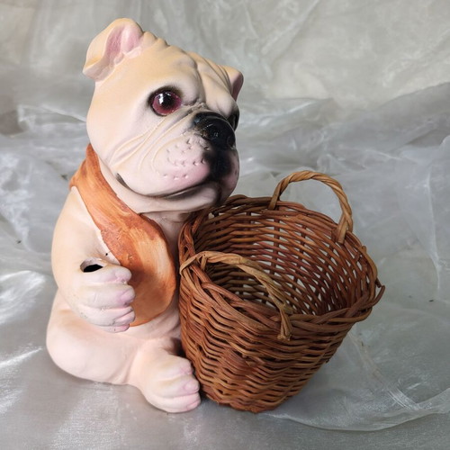 Decorative dog figure with basket