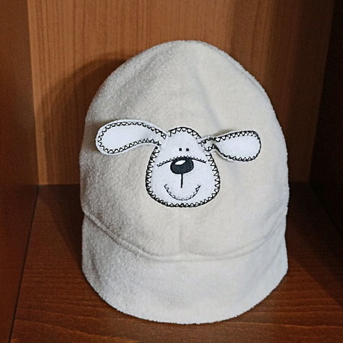 Children's hat with dog like new, size for bigger kids