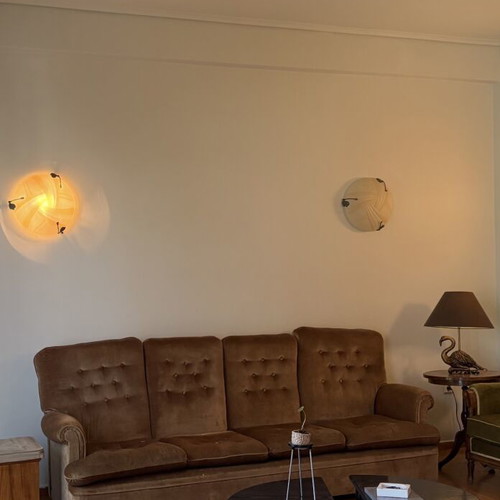 Brown sofa and green armchair furniture set