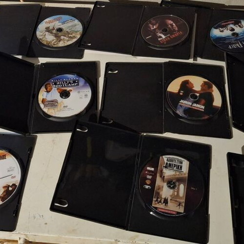 DVD movie pack used, 27 discs with and without cases, action genre