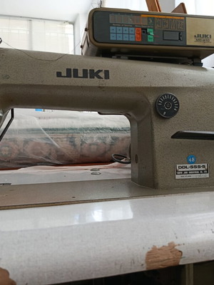 Juki DDL-555-5 industrial straight stitch sewing machine with motor and panel