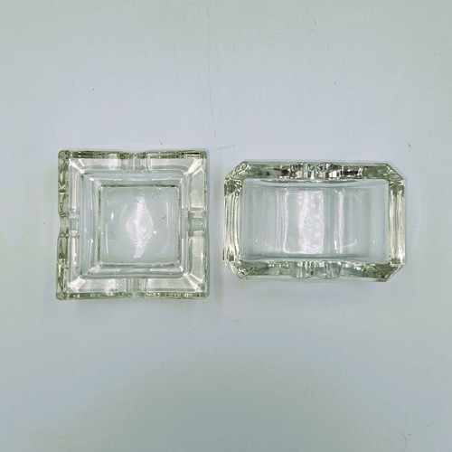 Set of 2 used crystal ashtrays in square and rectangular shapes