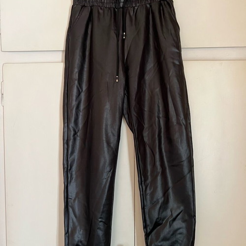 Black leather pants with elastic like new, size L/XL