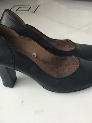 Black pumps used with stable high heel