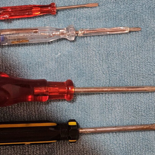 Hand tool set used with screwdrivers, pliers, hammer and work gloves