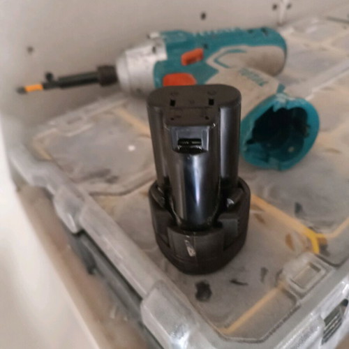 Total 12V pulse drill used with 2 batteries in good condition