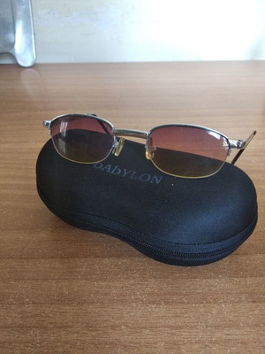 Sunglasses used, brown and silver, with glass lenses