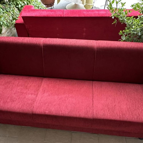 Two three-seater sofa beds, excellent condition
