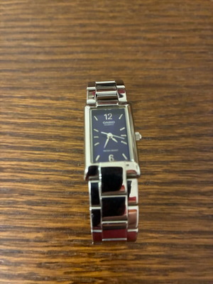 Casio vintage women's wristwatch with blue dial and silver bracelet like new