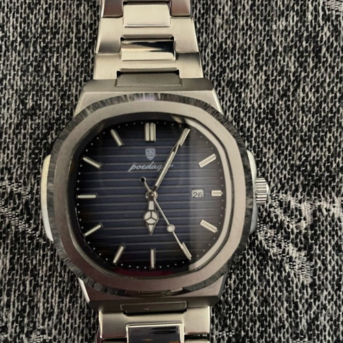 Men's watch metal bracelet like new, luminous and date display