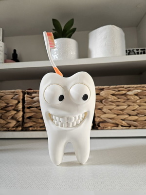 Toothbrush holder cartoon like new, 10x10x15cm