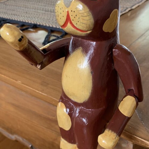 Wooden sitting cat with movable arms, like new, ~20 cm