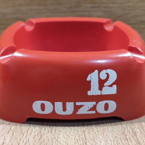 Ouzo 12 used red square plastic ashtray
