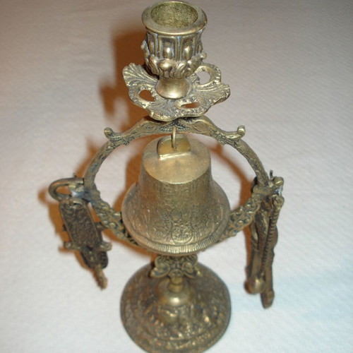 Brass candlestick with bell used