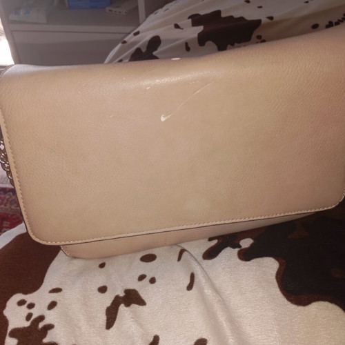 Vintage beige clutch bag used with gold chain details
