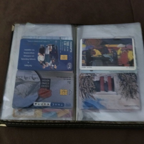 Collectible old phone cards used with album