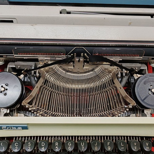 Erika vintage typewriter used with case