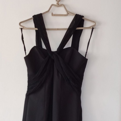 Multifunctional black dress with vintage gold earrings
