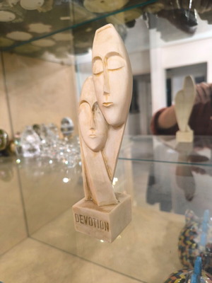 Artistic decorative sculpture with two faces like new