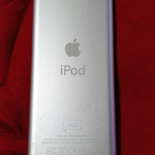 Apple MP3 digital music player with cracked screen