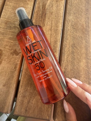 Youth Lab Wet Skin Dry Oil Sunscreen SPF 50 new with beta-carotene