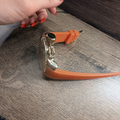 Loisir women's wristwatch like new, orange and gold