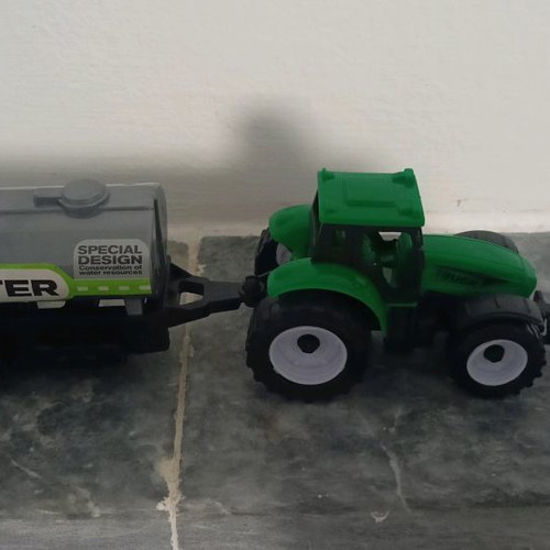 Toy tractor used, plastic, like new in box