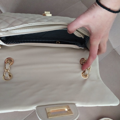 Women's beige handheld bag unused
