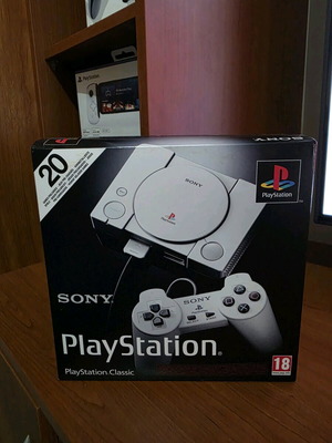 PlayStation Classic Mini like new with HD cable and 2 controllers