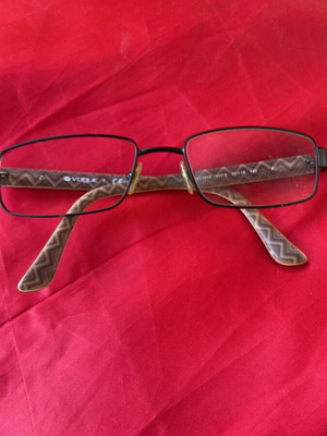 Vogue eyeglass frame like new with black and printed design