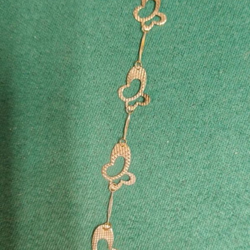 Bracelet new, silver color with butterfly design