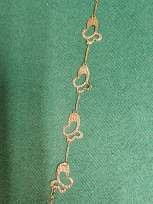 Bracelet new, silver color with butterfly design