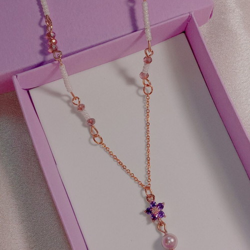 Fairycore necklace with purple and white elements