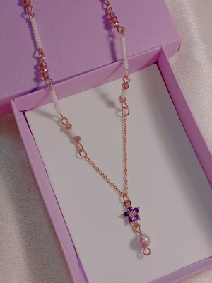 Fairycore necklace with purple and white elements