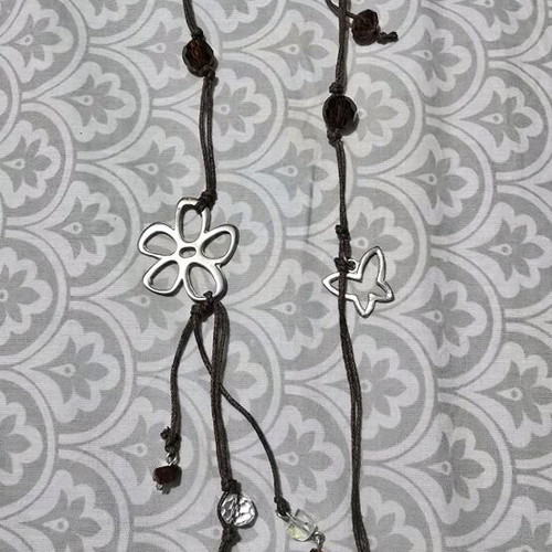 Necklace with beads and silver designs like new, brown and silver